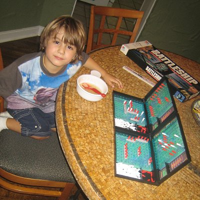 Max beating daddy at Battleship.